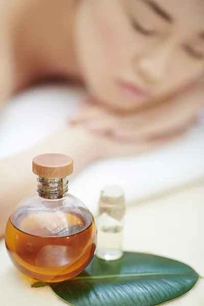 Spa oil and woman — Stock Photo, Image