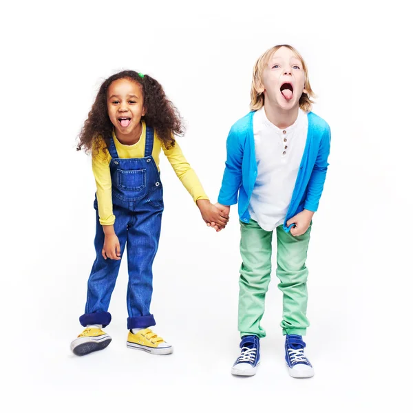 Sad kids holding hands — Stock Photo, Image