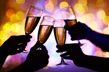 Hands toasting with champagne  clipart