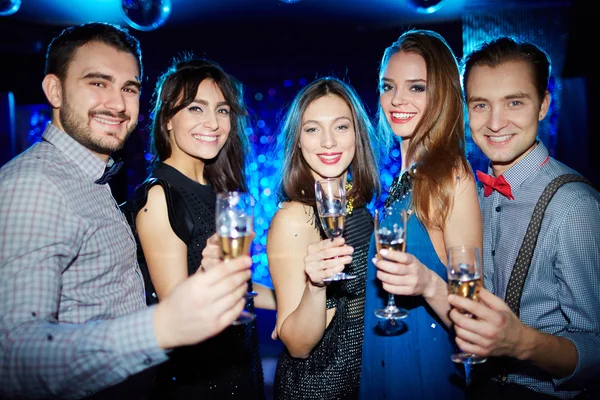 Friends with glasses of champagne — Stock Photo, Image