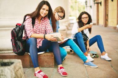 Pretty student with book