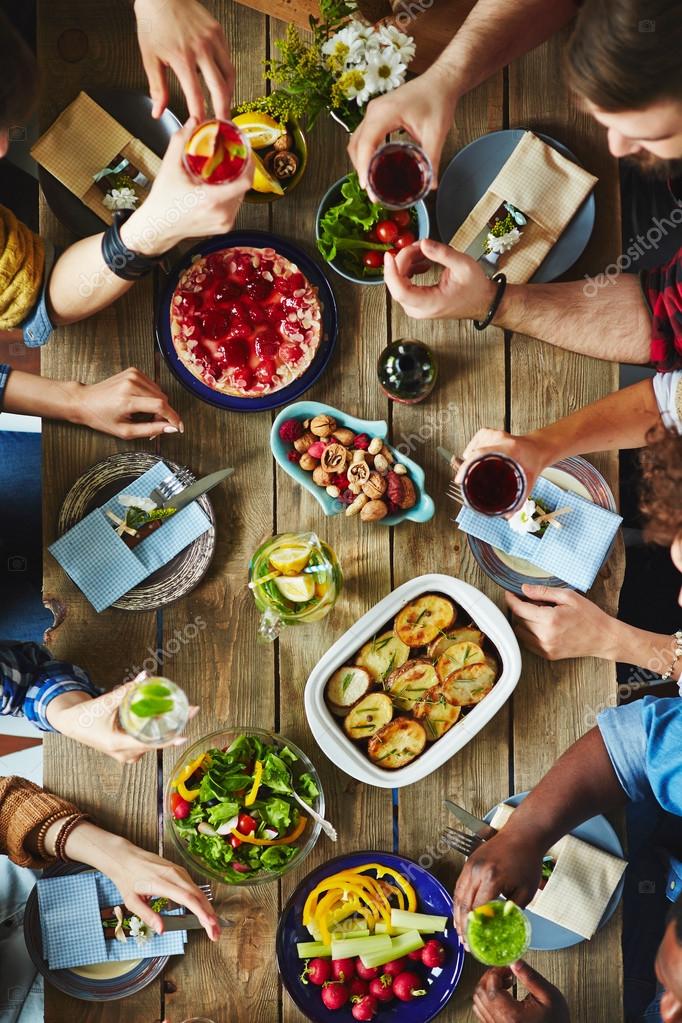 People eating dinner Stock Photo by ©pressmaster 107812194