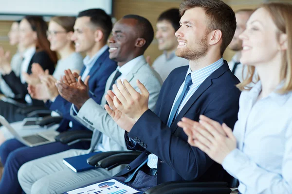 Employees applauding to speaker — Stock Photo, Image