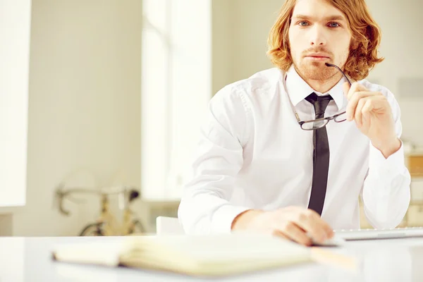 Pensive businessman with glasses — Stock Photo, Image