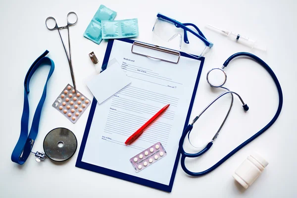 Medical clipboard and objects — Stock Photo, Image