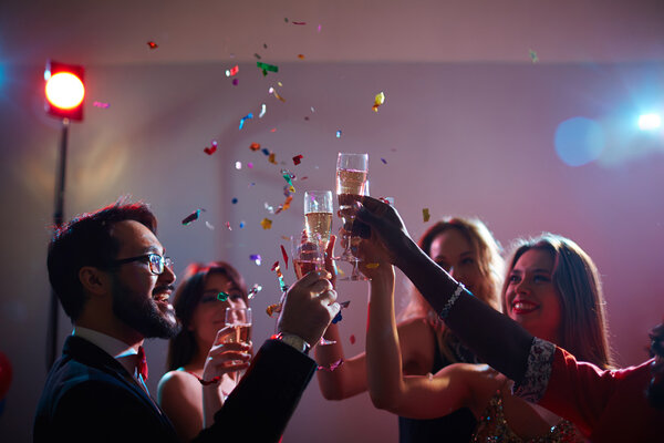 people toasting with champagne