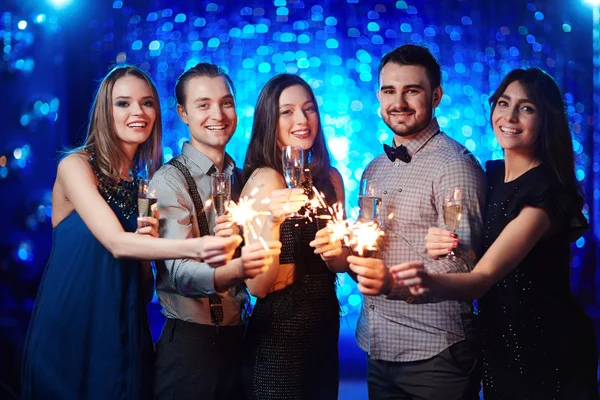 Happy friends with champagne — Stock Photo, Image