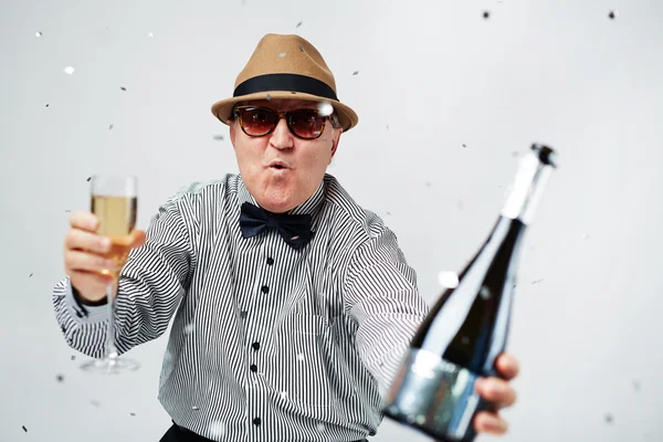 Senior man with champagne — Stock Photo, Image