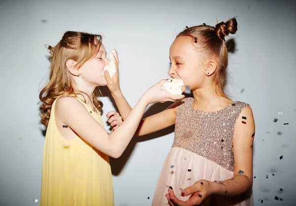 Girls playing with cake — Stock Photo, Image