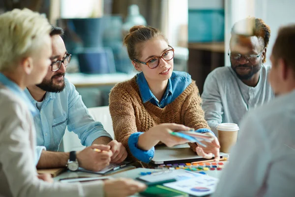 Colleagues communicating at meeting — Stock Photo, Image