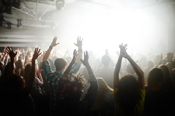 Fans with raised hands — Stock Photo, Image