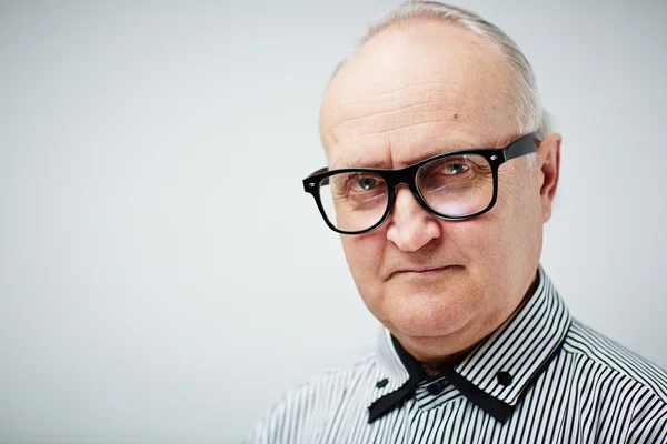 Senior man in eyeglasses — Stock Photo, Image