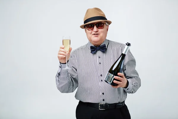 Senior man with champagne — Stock Photo, Image