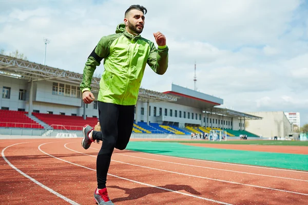 Joven deportista corriendo —  Fotos de Stock