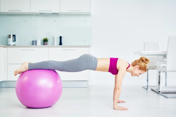 Girl exercising with fit-ball — Stock Photo, Image