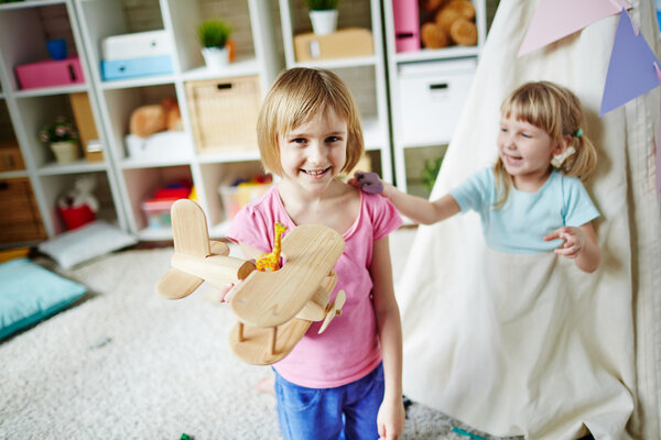 Two adorable girls playing 