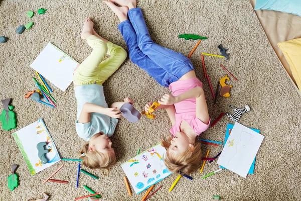 Cute girls playing with toys — Stock Photo, Image