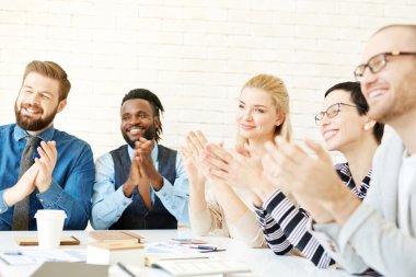 Managers applauding to speaker after presentation clipart