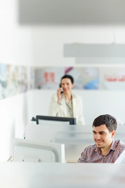 Colleagues working in open space office — Stock Photo, Image