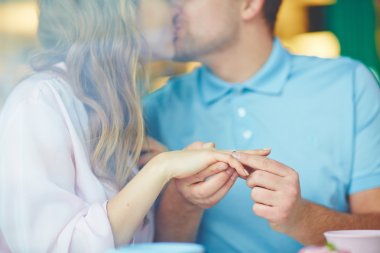 Romantic dates kissing during engagement 