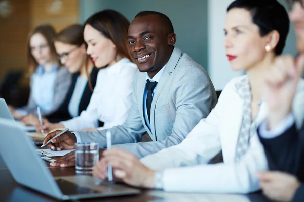 Managers listening to speaker — Stock Photo, Image