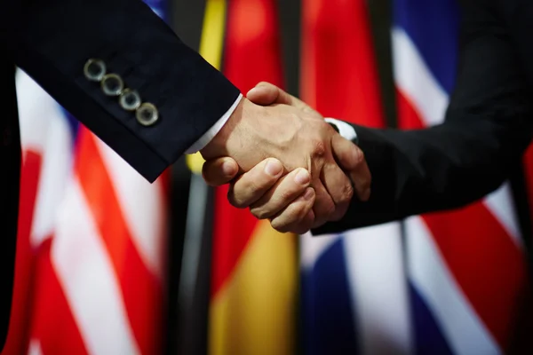 Handshake of two politicians — Stock Photo, Image