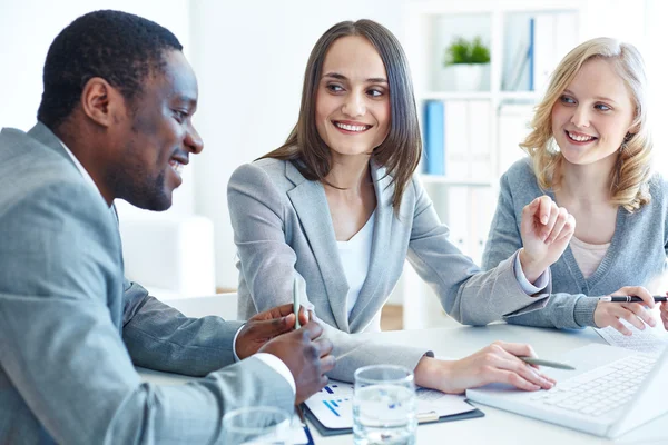 Businesspeople discussing during a meeting Stock Image