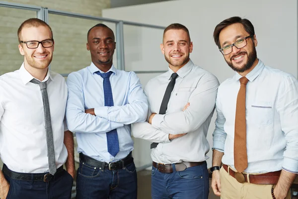 Successful businessmen looking at camera — Stock Photo, Image