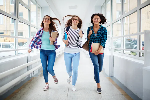 Three hurrying girls — Stock Photo, Image