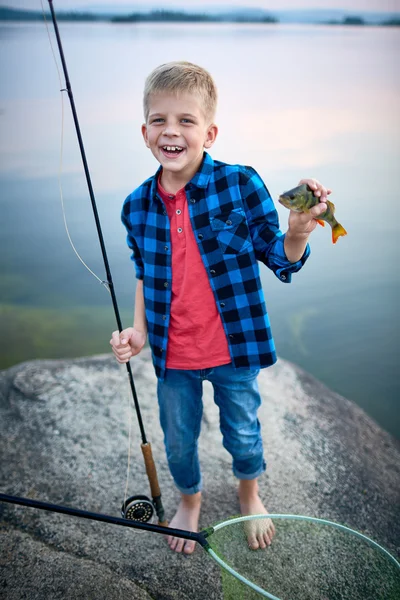 Successful boy with rod — Stock Photo, Image