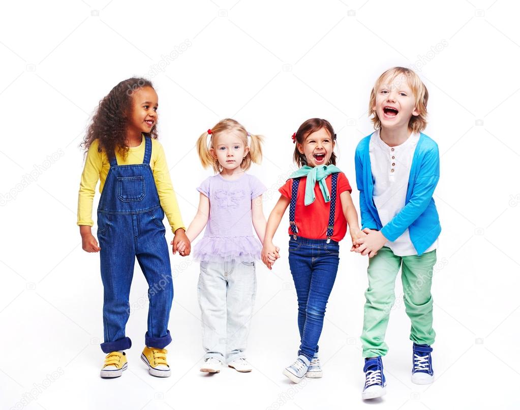 Happy children holding hands 