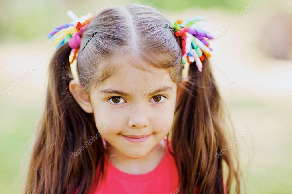 Two Ponytail Little Girl With Two Ponytails Stock Photo