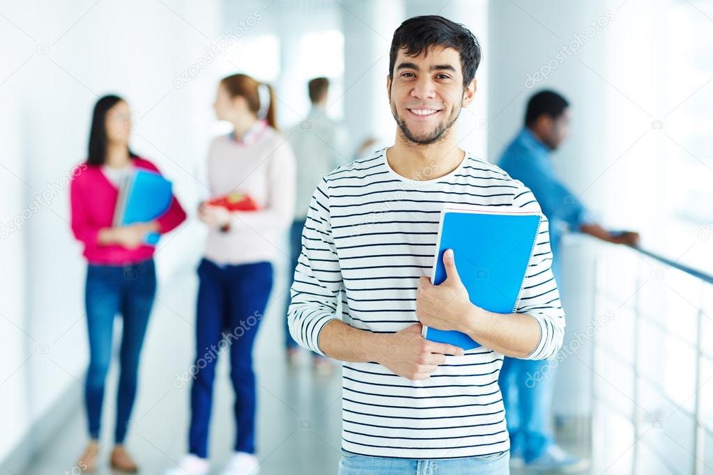 Smiling male college student