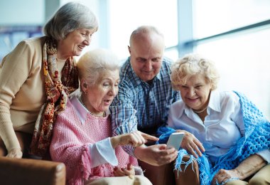 modern seniors with smartphone clipart