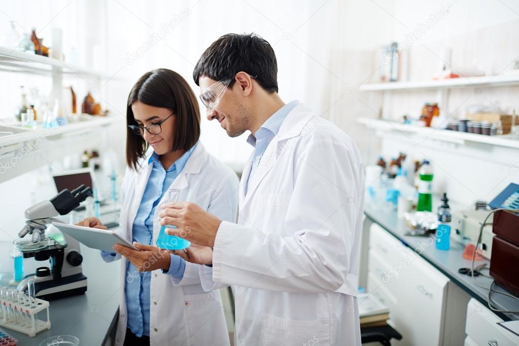 scientists browsing new chemical substance