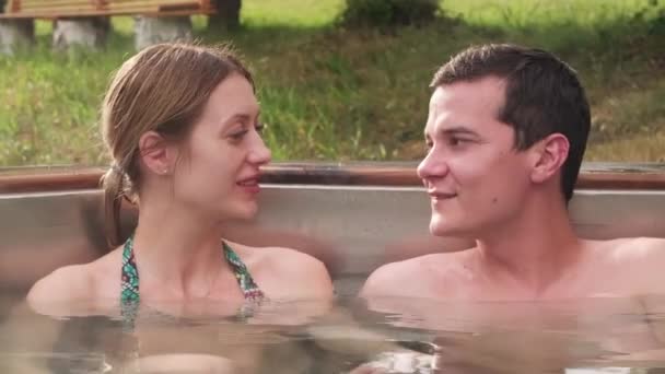 Medium Shot Happy Young Man Woman Sitting Hot Tub Outdoors — Stock Video