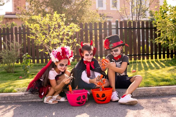 Cute Little Girl Two Boys Painted Faces Sitting Green Grass — Stock Photo, Image