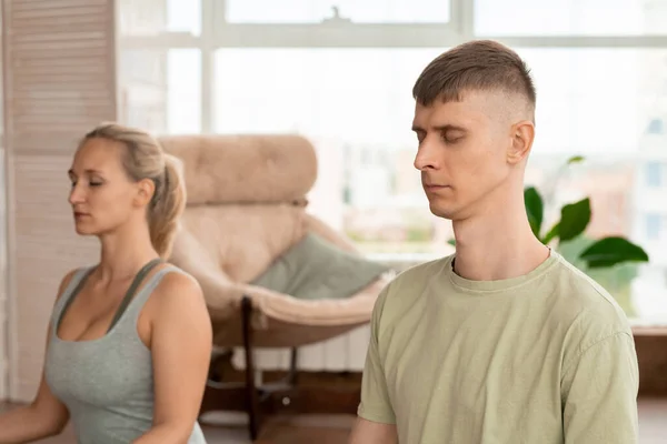 Young Relaxed Sportsman Activewear Keeping Eyes Closed While Practicing Meditation — Stock Photo, Image