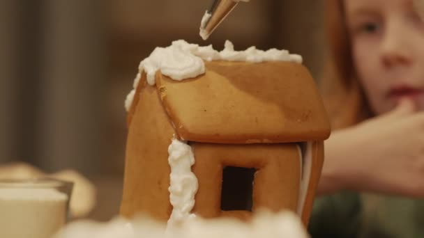 Closeup Decorating Gingerbread House Crusting Buttercream Christmas Eve — Stock Video
