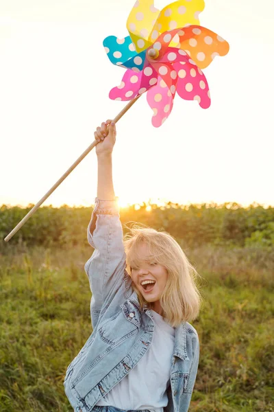 Ecstatic Young Blond Woman Denim Jacket White Tee Holding Large — Stock Photo, Image