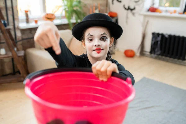 Portrait Smiling Mime Girl Heart Drawn Lips Pointing Bucket Asking — Stock Photo, Image