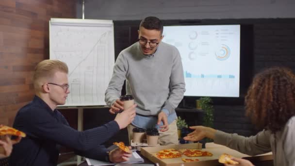 Medium Shot Young Smiling Middle Eastern Man Bringing Coffee Colleagues — Stock Video