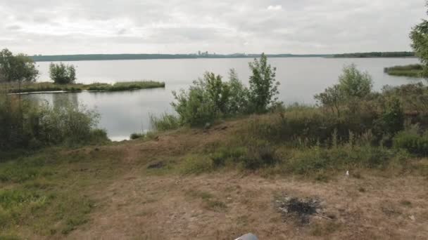 Drone Shot Happy Young Men Sitting Motorcycles Parked Lake Chatting — Stock Video