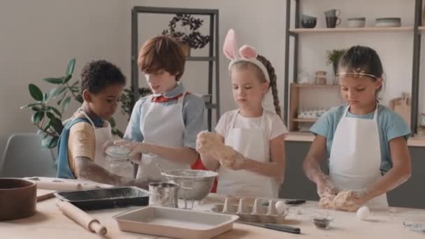 Multicultural Female Male Children Wearing Aprons Playing Kitchen Table Brown — Stock Video