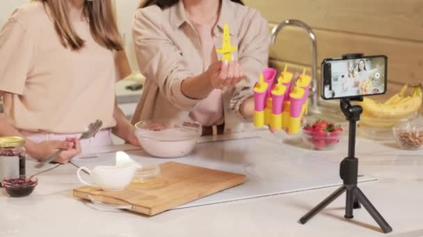 Joyful Mother Daughter Making Homemade Ice Cream Kitchen Recording Process — Stock Video