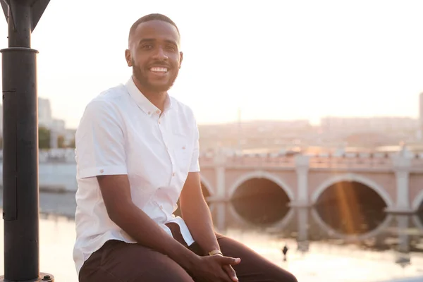 Happy Young African Businessman White Shirt Brown Pants Sitting Front — Stock Fotó