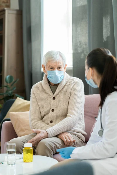Sick Senior Man Casualwear Protective Medical Mask Sitting Couch Small — Fotografia de Stock