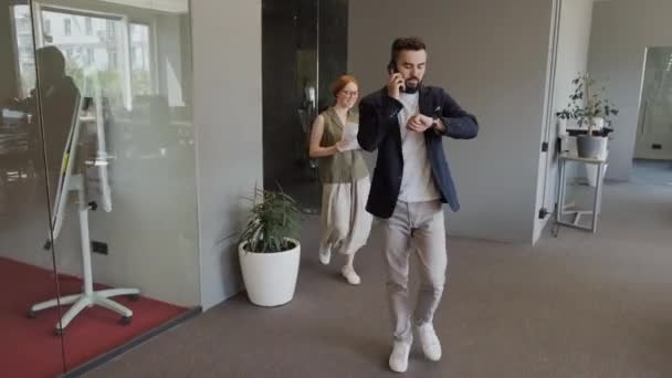 Full Shot Busy Bearded Businessman Entering Modern Office Room Talking — Stock Video