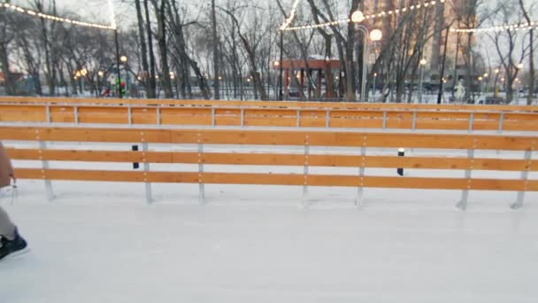 Locked Slow Motion Shot Cheerful Family Ice Skating Train Formation — Vídeo de Stock