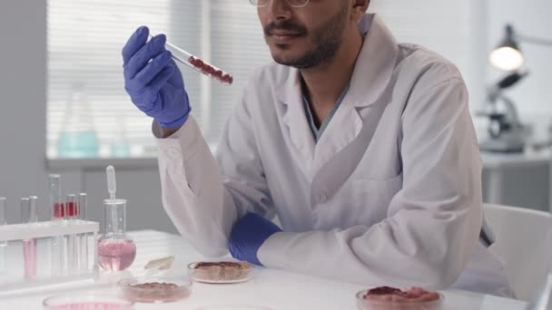 Tilting Slow Motion Shot Middle Eastern Microbiology Scientist Holding Test — Vídeo de stock